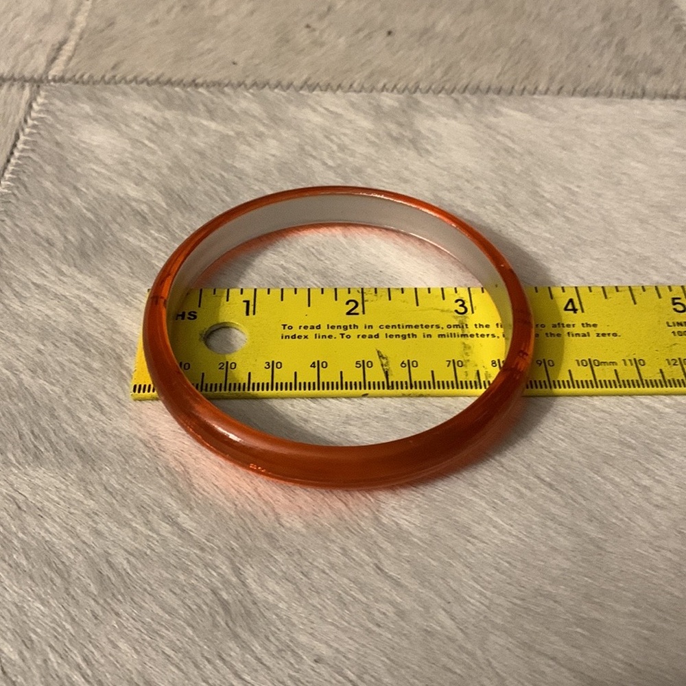 Orange plastic/resin bracelet